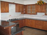 KITCHEN WITH RUBBER WOOD SHUTTERS